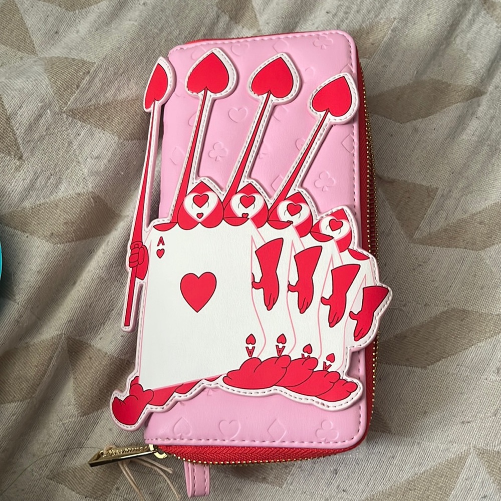 Disney’s Alice in wonderland wallet. Loungefly